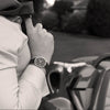 Vanacci watch worn in front of a Ferrari in black and white   