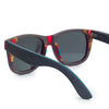 Wooden sunglasses with blue and red highlights on white Background 