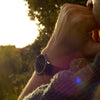 Vanacci watch worn by a man in front of a sunset
