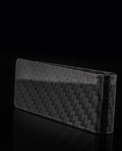 Solid Carbon fibre money clip by vanacci with polished edge