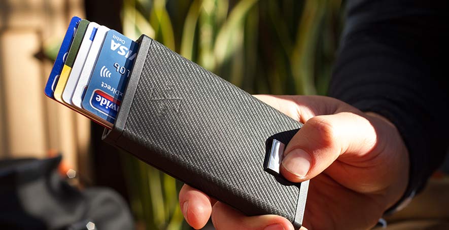 Carbon exo with carbon leather ejecting credit cards