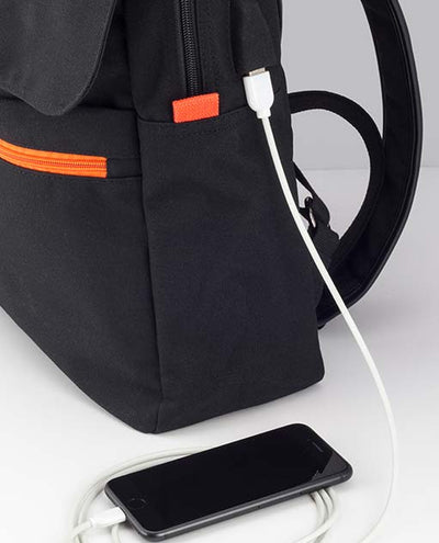 Vanacci canvas laptop backpack in black and orange charging phone