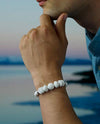 Vanacci Lockstone All White Perfume Bracelet worn on a man